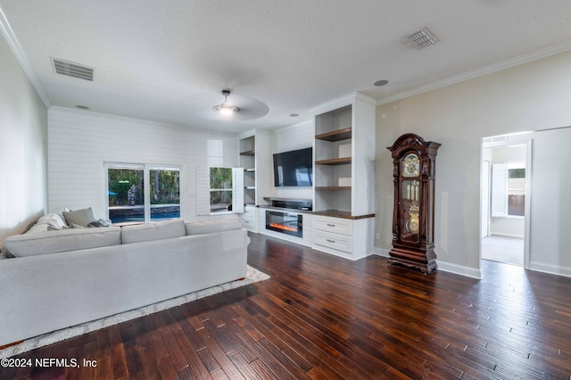 living room featuring ceiling fan, dark hardwood / wood-style flooring, crown molding, and a textured ceiling