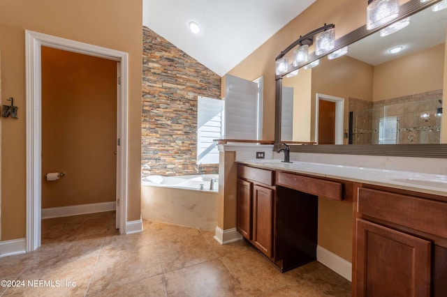 bathroom featuring tile patterned flooring, vanity, lofted ceiling, and shower with separate bathtub