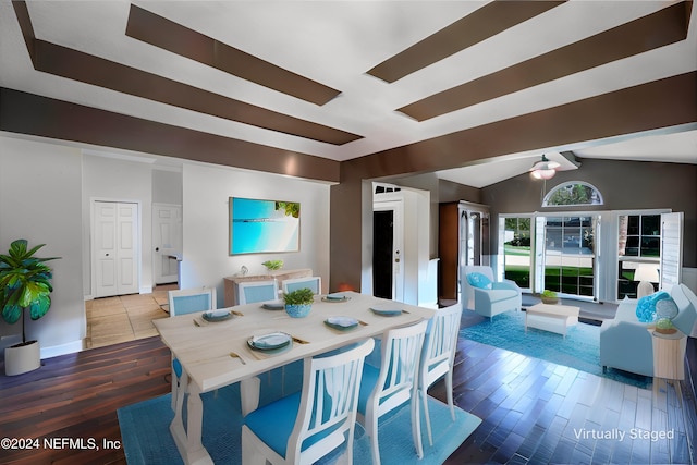 dining space featuring vaulted ceiling with beams, ceiling fan, and hardwood / wood-style flooring