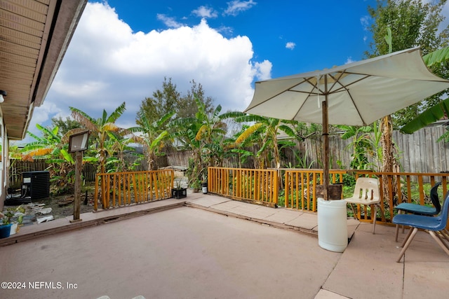 view of patio with central AC