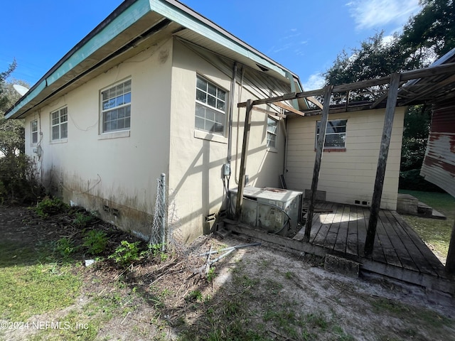 view of home's exterior featuring ac unit