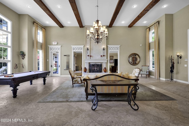 game room featuring beamed ceiling, a towering ceiling, and billiards