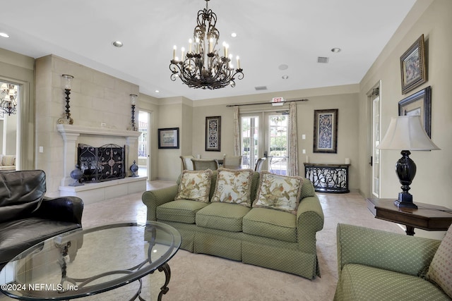 living room with a fireplace and french doors