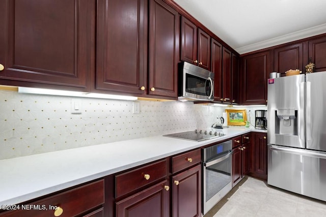 kitchen with tasteful backsplash, light tile patterned floors, ornamental molding, and appliances with stainless steel finishes