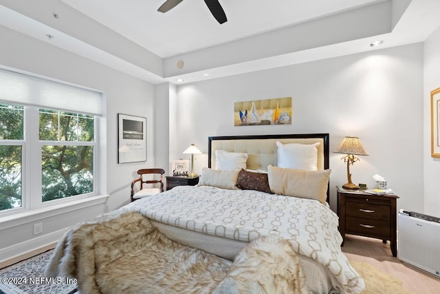 bedroom featuring radiator and ceiling fan