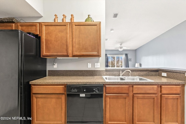 kitchen featuring ceiling fan, black appliances, sink, and vaulted ceiling