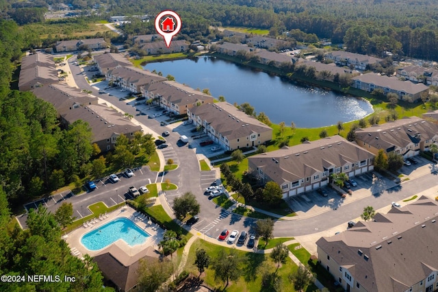 drone / aerial view with a water view