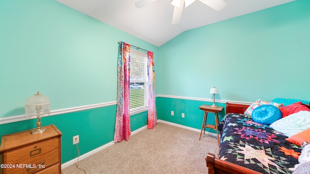 bedroom featuring ceiling fan, light carpet, and lofted ceiling