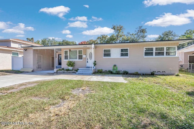 ranch-style house with a front yard