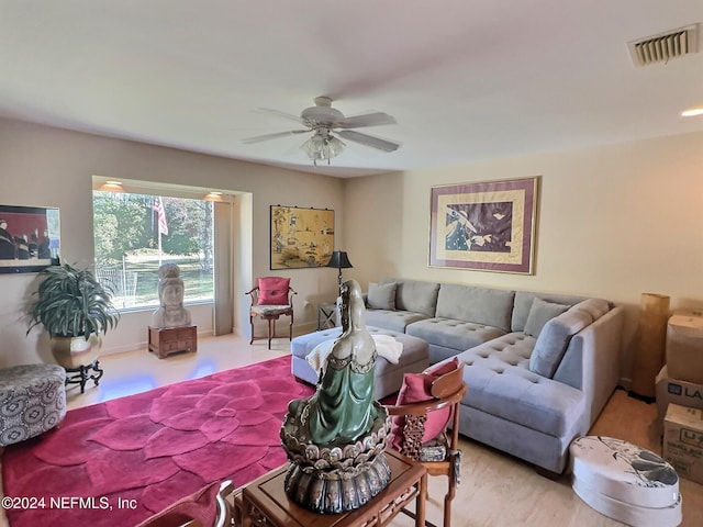 living room with ceiling fan