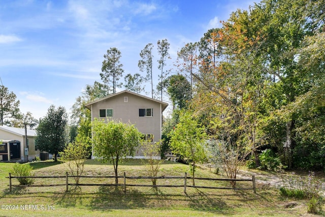 view of property exterior featuring a yard