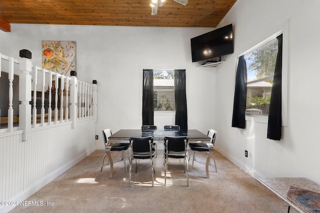 dining space featuring carpet flooring, wooden ceiling, and vaulted ceiling