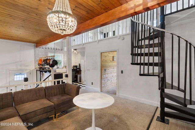 living room with beam ceiling, wooden ceiling, an inviting chandelier, and hardwood / wood-style floors