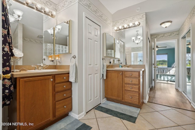 bathroom with vanity and hardwood / wood-style flooring