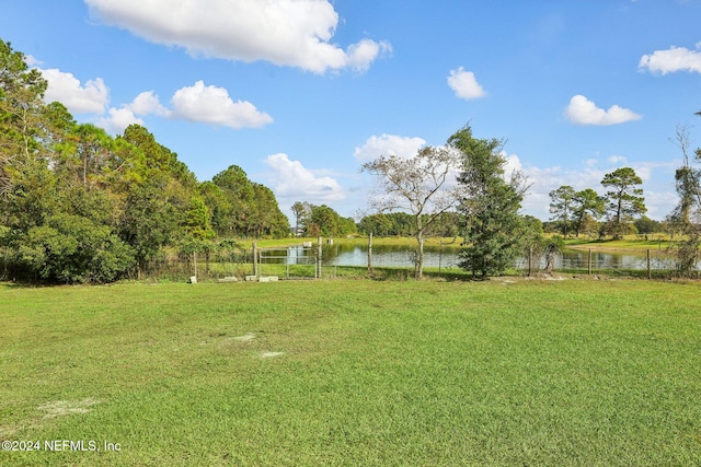 view of yard with a water view