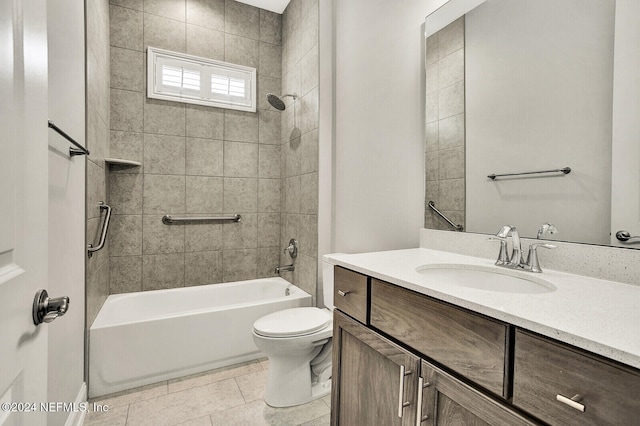 full bathroom with tiled shower / bath, vanity, toilet, and tile patterned flooring