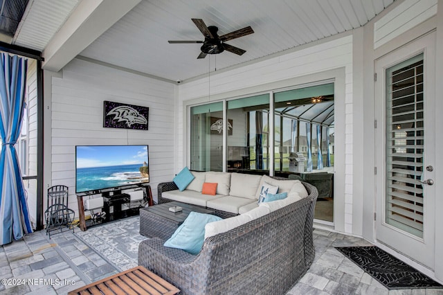 view of patio with ceiling fan and an outdoor living space