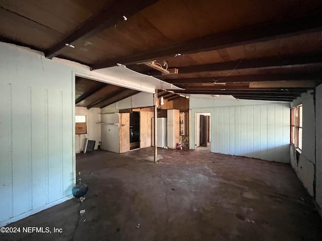 basement featuring wood walls