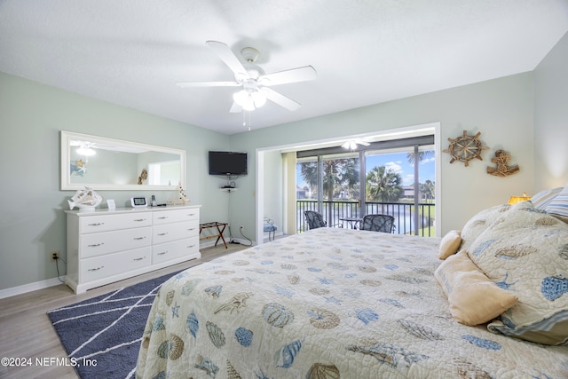 bedroom featuring access to outside, ceiling fan, and light hardwood / wood-style floors