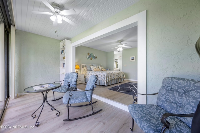 bedroom featuring wood-type flooring and ceiling fan