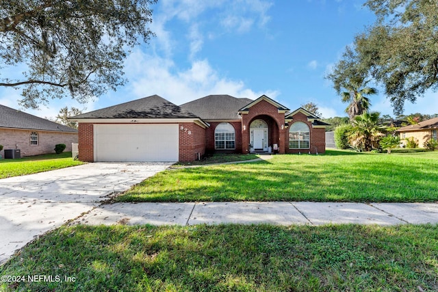 ranch-style home with central AC, a front yard, and a garage