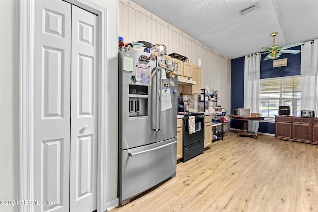 978 Tammy Cove Ln, Jacksonville, FL 32218 - kitchen with visible vents, stainless steel fridge, under cabinet range hood, black range with electric cooktop, and light wood-style flooring