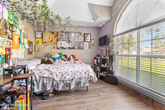 bedroom with wood-type flooring