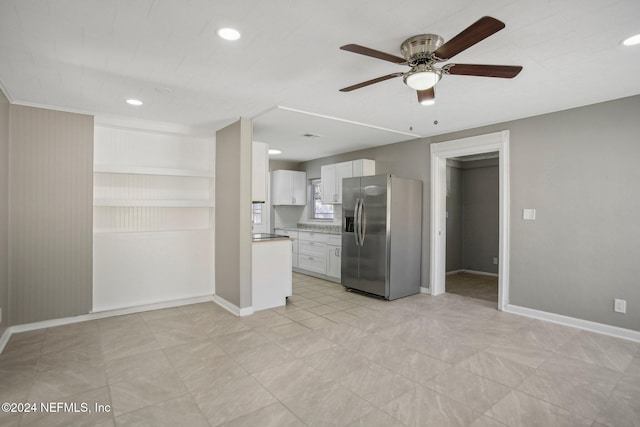 3730 Abby Ln, Jacksonville, FL 32207 - kitchen with ceiling fan, white cabinetry, and stainless steel refrigerator with ice dispenser