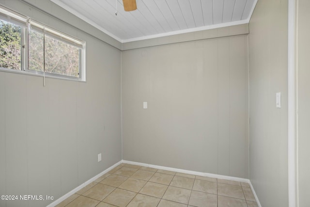 3730 Abby Ln, Jacksonville, FL 32207 - tiled empty room featuring ceiling fan, ornamental molding, and wooden ceiling