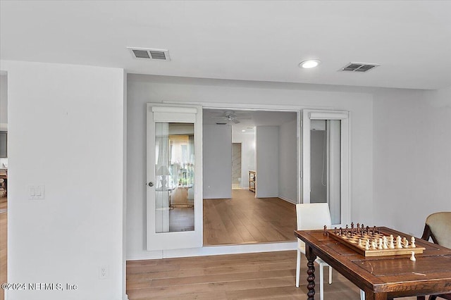 interior space featuring ceiling fan and hardwood / wood-style floors