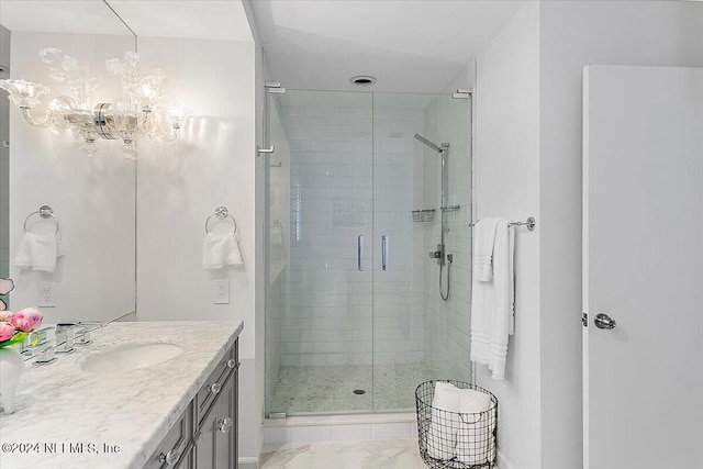 bathroom with vanity and walk in shower