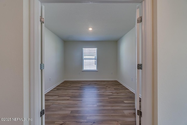 2320 Dallas Creek Ln, Green Cove Springs, FL 32043 - spare room featuring wood finished floors and baseboards