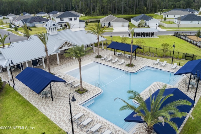 2320 Dallas Creek Ln, Green Cove Springs, FL 32043 - community pool featuring a patio, a forest view, and a residential view