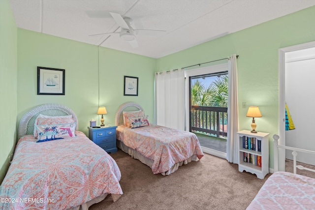 bedroom with access to outside, a textured ceiling, light colored carpet, and ceiling fan