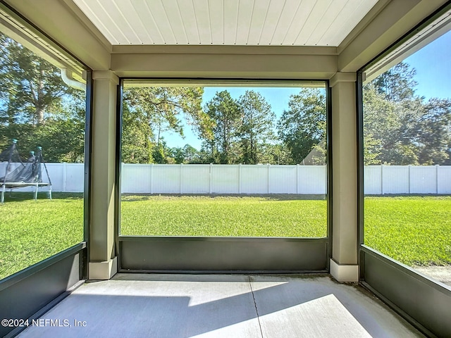 unfurnished sunroom with a healthy amount of sunlight