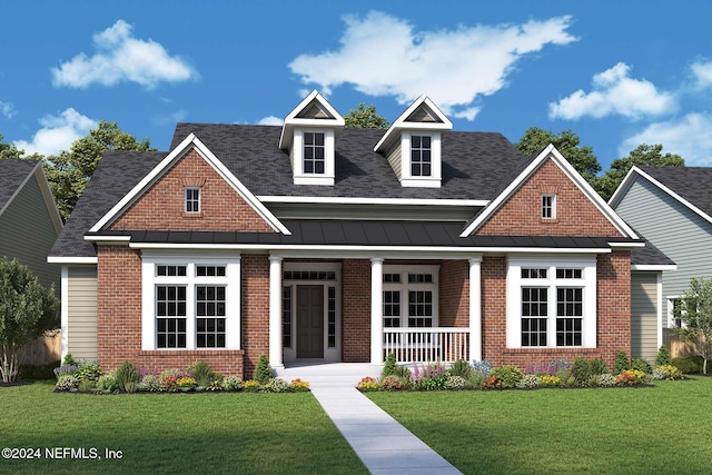 craftsman-style house with a porch, roof with shingles, a standing seam roof, and a front yard