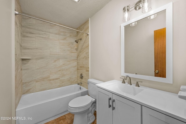 full bathroom featuring vanity, tiled shower / bath combo, a textured ceiling, and toilet