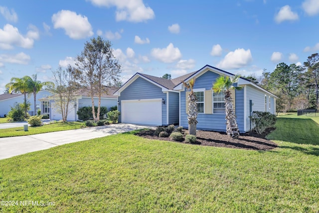 single story home featuring a garage and a front yard