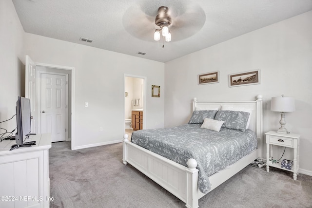 647 La Mancha Dr, Saint Augustine, FL 32086 - bedroom featuring carpet floors, baseboards, a ceiling fan, and ensuite bathroom