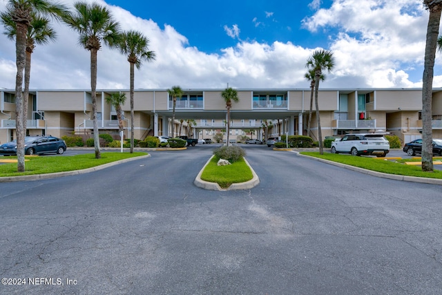 view of building exterior featuring a carport