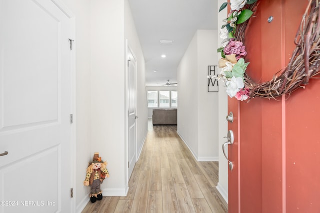 hallway featuring light hardwood / wood-style flooring