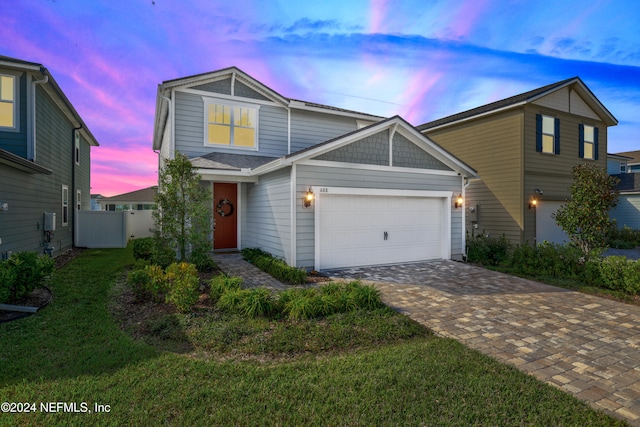 view of front of property with a yard