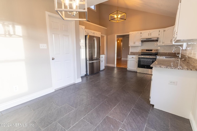 kitchen with hanging light fixtures, sink, an inviting chandelier, white cabinetry, and appliances with stainless steel finishes