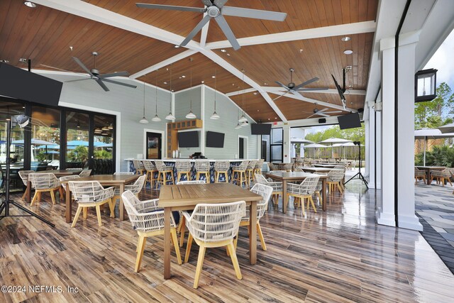 608 Continuum Loop, Yulee, FL 32097 - dining space with a ceiling fan, wood ceiling, wood finished floors, and high vaulted ceiling