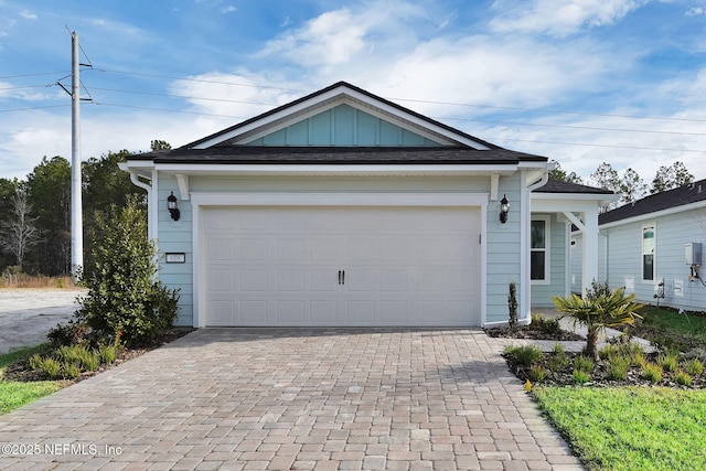 ranch-style house featuring a garage