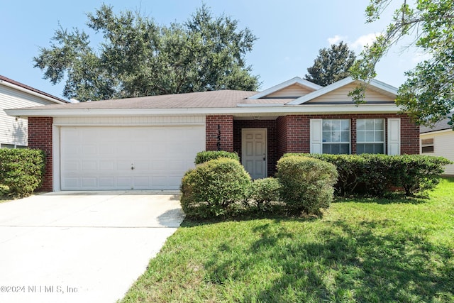 ranch-style house featuring a front yard and a garage