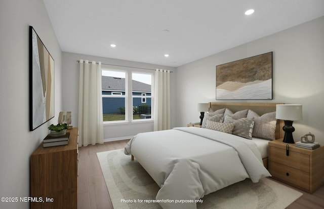 bedroom featuring recessed lighting and light wood-type flooring