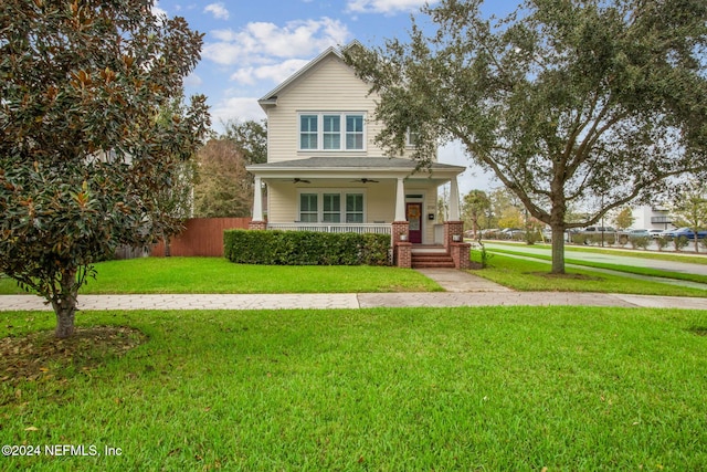 view of front of house with a front lawn and a porch