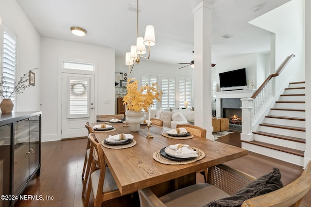 dining space with ceiling fan and dark hardwood / wood-style floors