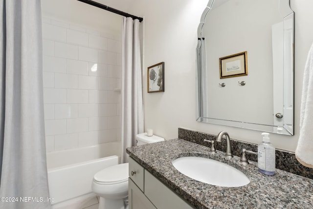 full bathroom with vanity, shower / bath combination with curtain, and toilet